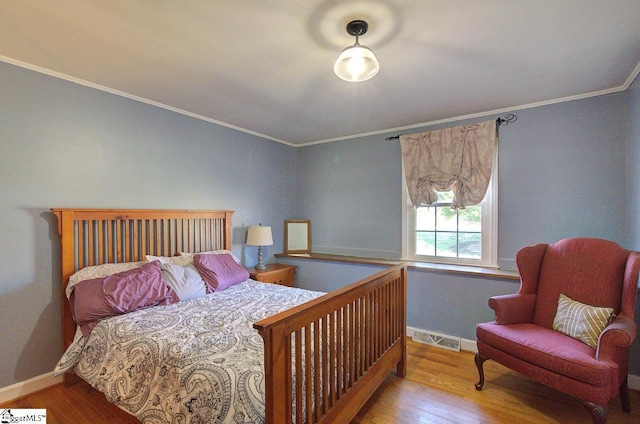 411 Westcliffe Way, Greenville, SC 29611 - bedroom with baseboards, ornamental molding, visible vents, and wood finished floors