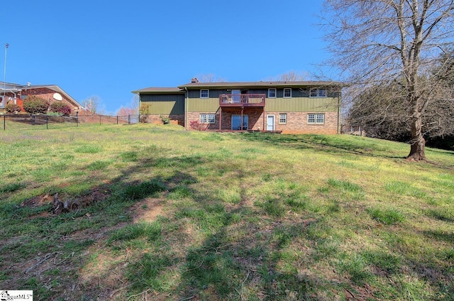 411 Westcliffe Way, Greenville, SC 29611 - back of property featuring a lawn, fence, and brick siding