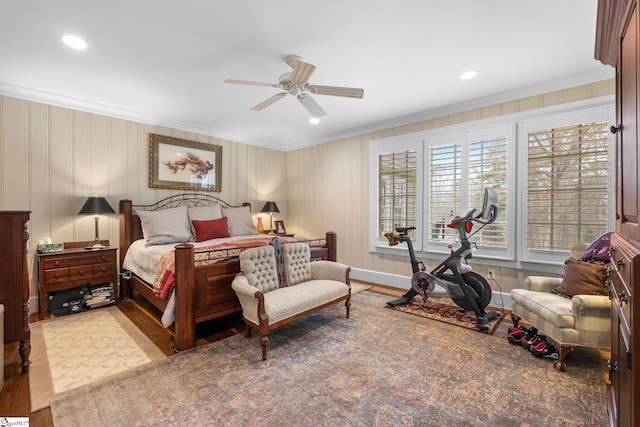 bedroom featuring recessed lighting, ornamental molding, ceiling fan, and wood finished floors