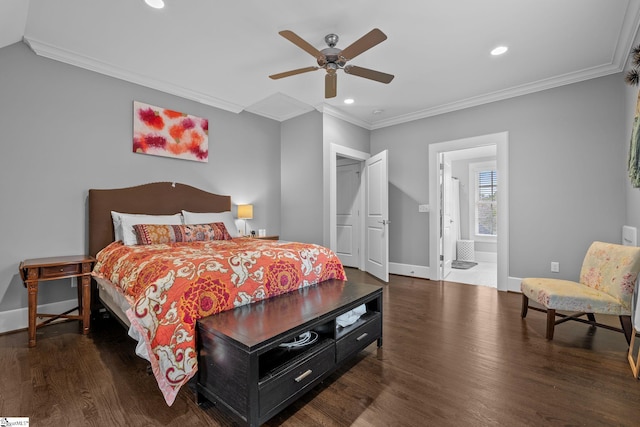 bedroom featuring baseboards, ornamental molding, and wood finished floors
