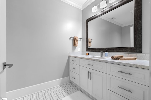 bathroom with vanity, ornamental molding, baseboards, tile patterned floors, and visible vents