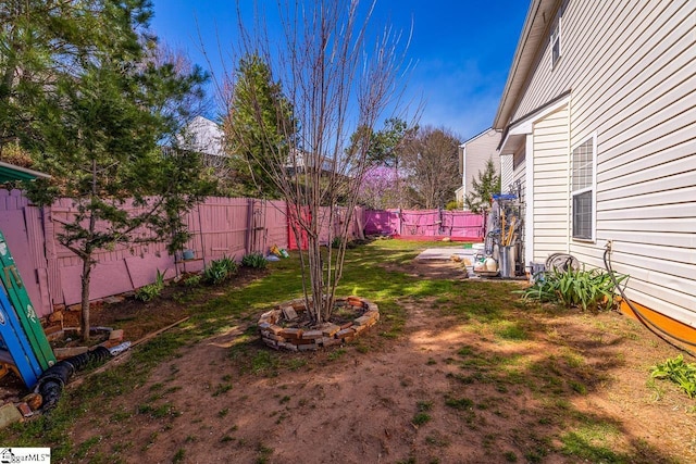view of yard with a fenced backyard