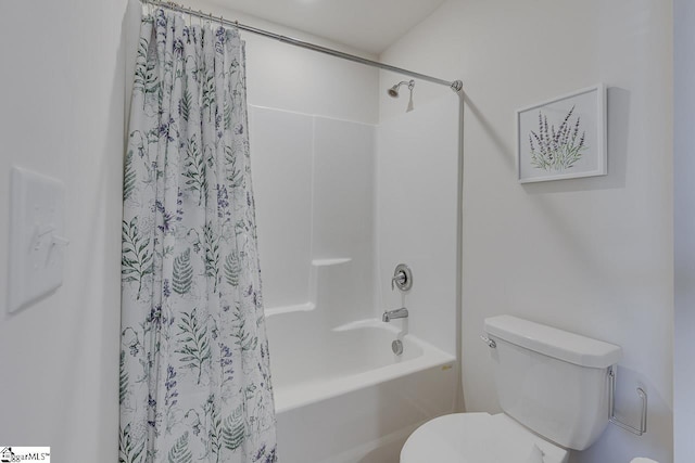 full bath with shower / tub combo and toilet