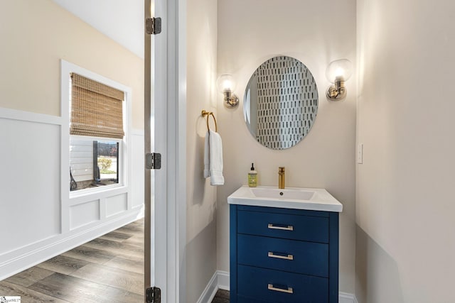 130 Park Ave, Greer, SC 29651 - bathroom featuring baseboards, wood finished floors, and vanity