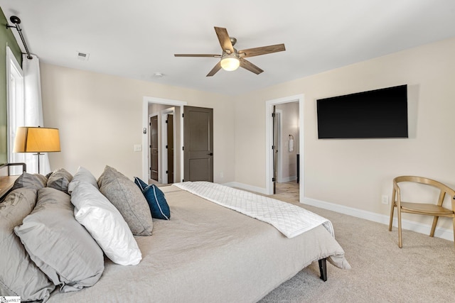 130 Park Ave, Greer, SC 29651 - bedroom with baseboards, ceiling fan, and light carpet