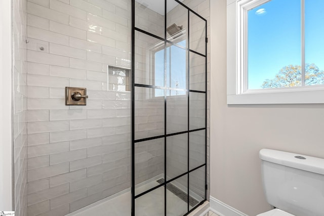 130 Park Ave, Greer, SC 29651 - full bath featuring toilet, baseboards, and tiled shower