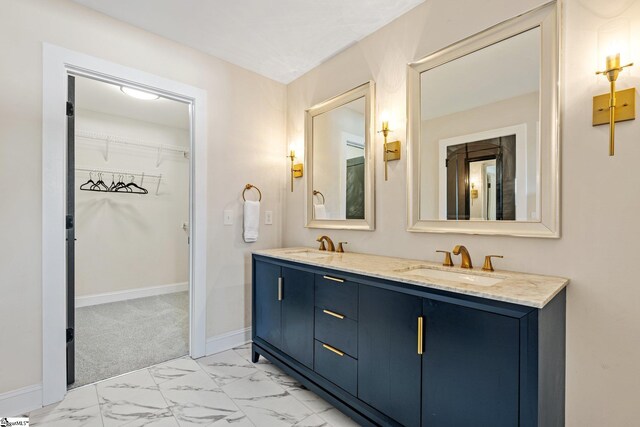 130 Park Ave, Greer, SC 29651 - full bath featuring marble finish floor, baseboards, double vanity, and a sink