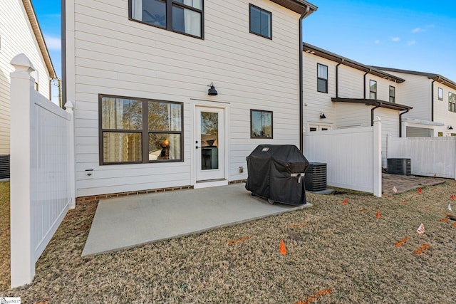 130 Park Ave, Greer, SC 29651 - rear view of property with fence, a patio area, and central AC