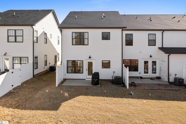 130 Park Ave, Greer, SC 29651 - rear view of house with central air condition unit, fence, and a patio area