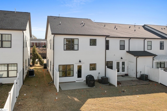 130 Park Ave, Greer, SC 29651 - rear view of house with french doors, a fenced backyard, cooling unit, and a patio