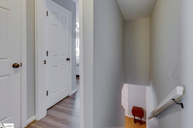 hall featuring wood finished floors