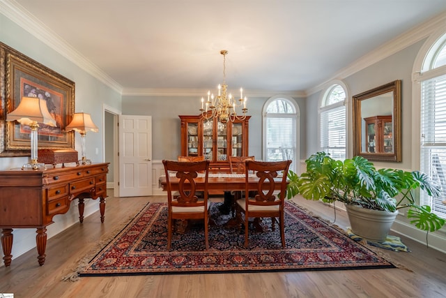 6 Bentford Ct, Simpsonville, SC 29681 - dining room with ornamental molding, wood finished floors, and a notable chandelier