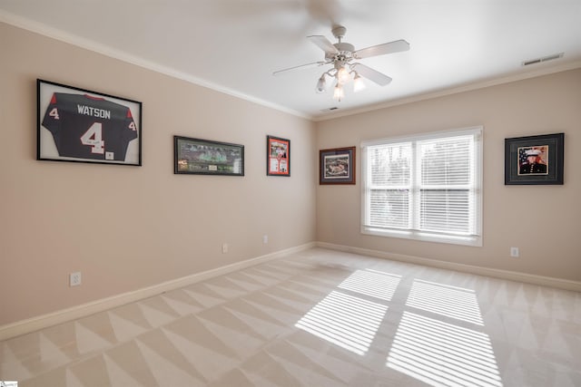 6 Bentford Ct, Simpsonville, SC 29681 - spare room with a ceiling fan, baseboards, light colored carpet, visible vents, and ornamental molding