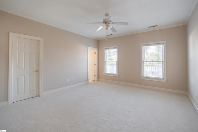 6 Bentford Ct, Simpsonville, SC 29681 - carpeted spare room featuring a ceiling fan, ornamental molding, baseboards, and visible vents