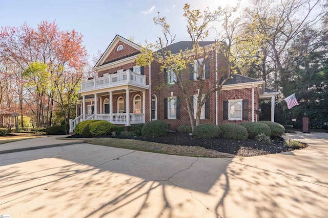 6 Bentford Ct, Simpsonville, SC 29681 - view of front of property featuring a balcony, a porch, and brick siding