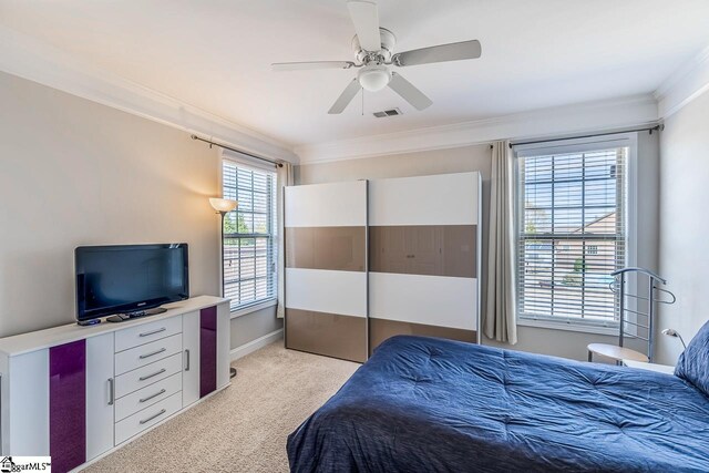 105 Cooper Oaks Ct, Simpsonville, SC 29681 - bedroom with a ceiling fan, visible vents, ornamental molding, and light carpet