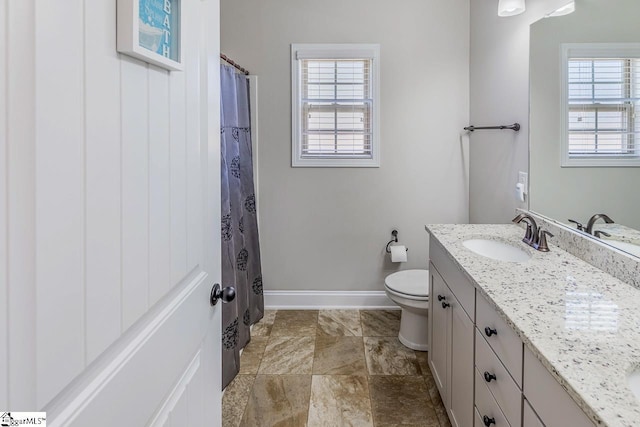 105 Cooper Oaks Ct, Simpsonville, SC 29681 - bathroom featuring baseboards, curtained shower, toilet, and vanity