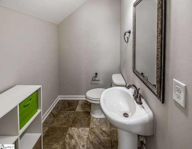 105 Cooper Oaks Ct, Simpsonville, SC 29681 - half bathroom featuring baseboards, toilet, and a sink