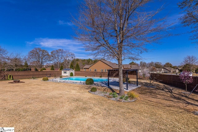 105 Cooper Oaks Ct, Simpsonville, SC 29681 - view of yard featuring a patio area, a fenced in pool, an outbuilding, a fenced backyard, and a storage unit