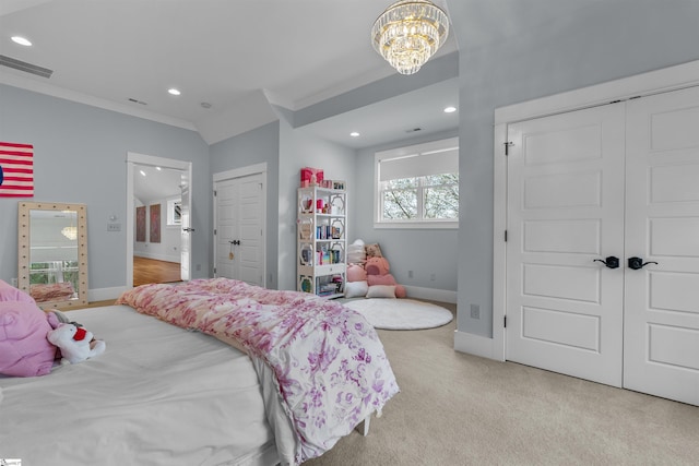bedroom featuring an inviting chandelier, crown molding, baseboards, and visible vents