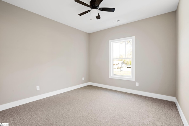 225 Cedar St, Woodruff, SC 29388 - carpeted spare room with baseboards, visible vents, and a ceiling fan