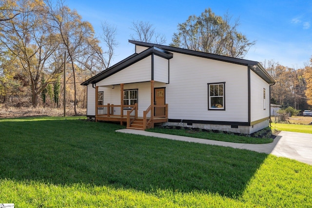 225 Cedar St, Woodruff, SC 29388 - mid-century inspired home with covered porch, a front lawn, and crawl space