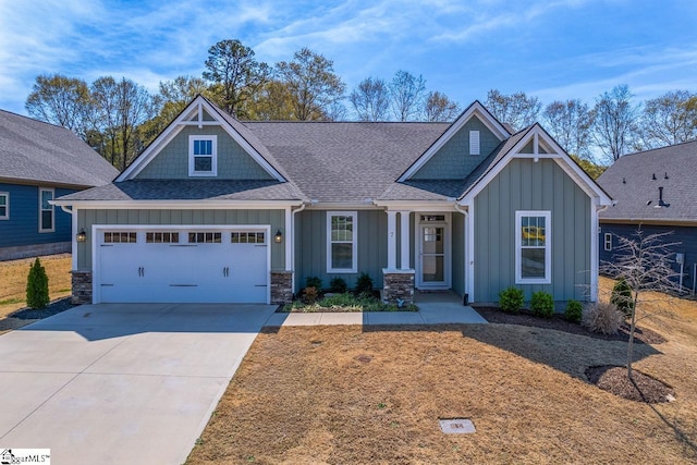 7 Ridgebury Pl, Greenville, SC 29607 - craftsman house featuring driveway, a shingled roof, a garage, and board and batten siding