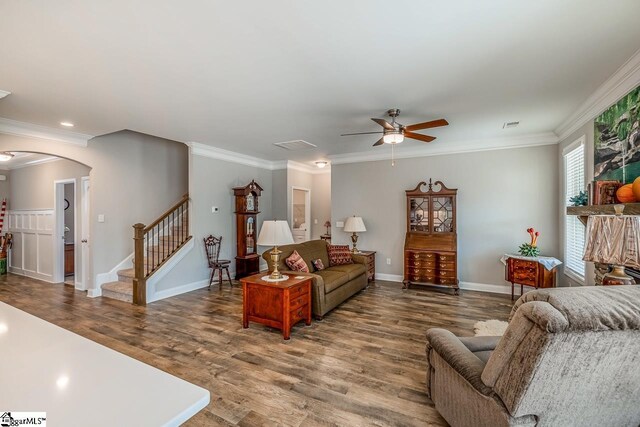 7 Ridgebury Pl, Greenville, SC 29607 - living room featuring a ceiling fan, arched walkways, crown molding, and wood finished floors