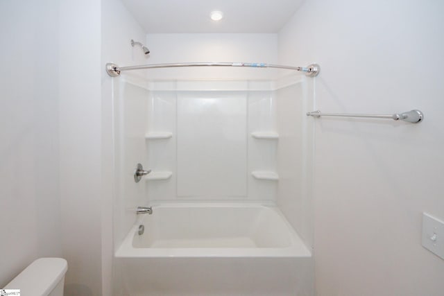 full bathroom featuring toilet and walk in shower
