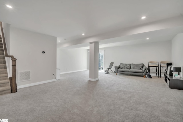 carpeted living area featuring recessed lighting, baseboards, stairs, and visible vents