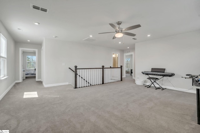 interior space with recessed lighting, baseboards, visible vents, and ceiling fan