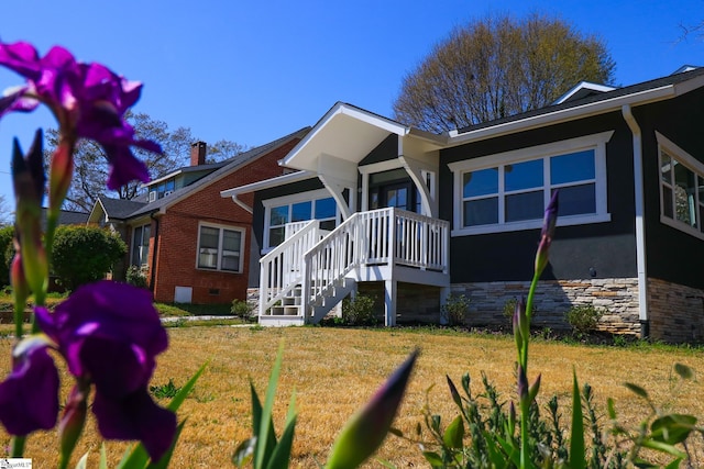 exterior space featuring crawl space and a lawn