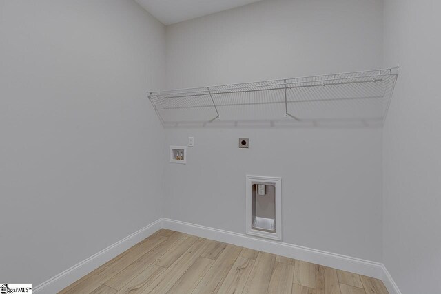 114 Walters Way, Pickens, SC 29671 - laundry area with hookup for an electric dryer, light wood-style flooring, washer hookup, and baseboards