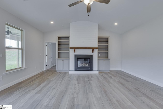 114 Walters Way, Pickens, SC 29671 - unfurnished living room featuring lofted ceiling, a ceiling fan, light wood finished floors, a large fireplace, and baseboards