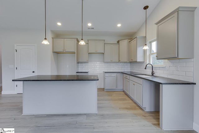 114 Walters Way, Pickens, SC 29671 - kitchen featuring a sink, backsplash, a center island, dark stone counters, and recessed lighting