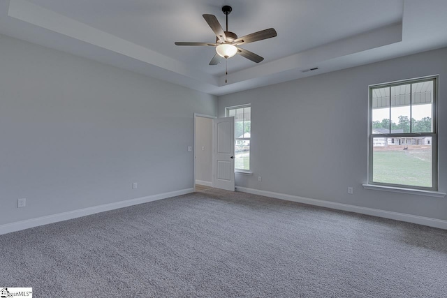 114 Walters Way, Pickens, SC 29671 - unfurnished room with a tray ceiling, ceiling fan, baseboards, and carpet flooring