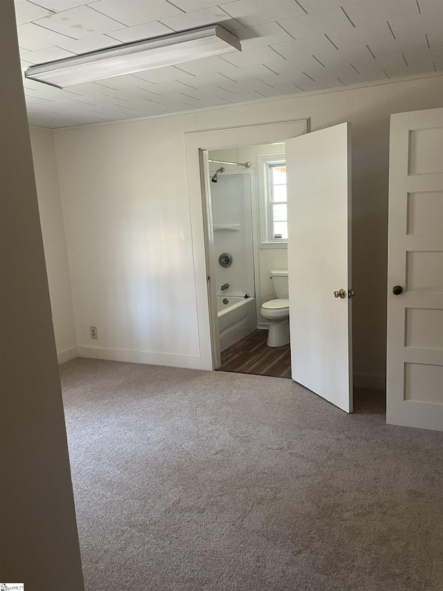 1273 Powerhouse Rd, Ware Shoals, SC 29692 - unfurnished bedroom with carpet floors and connected bathroom