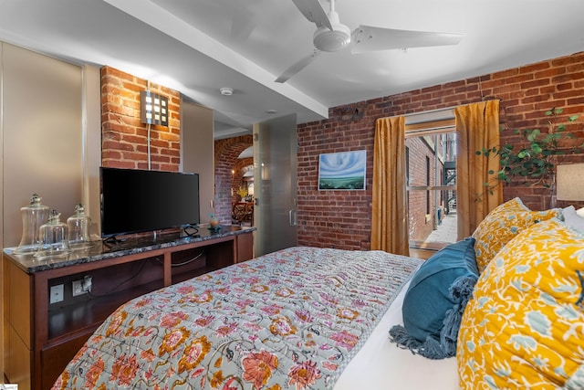400 E Washington St Unit 28, Greenville, SC 29601 - bedroom with a ceiling fan and brick wall