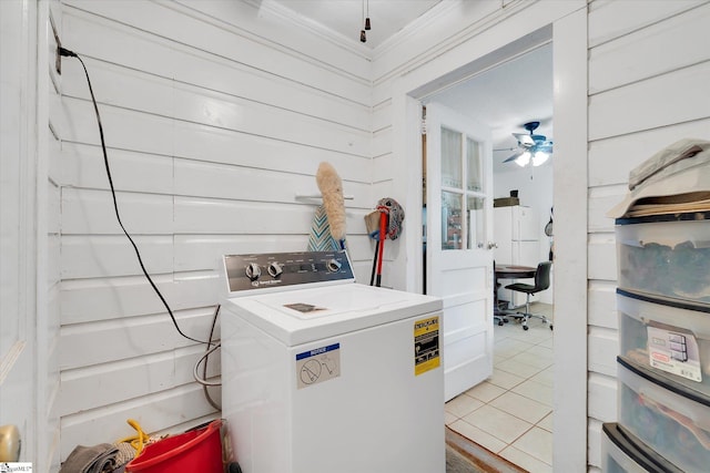 washroom with crown molding, light tile patterned floors, washer / dryer, a ceiling fan, and laundry area