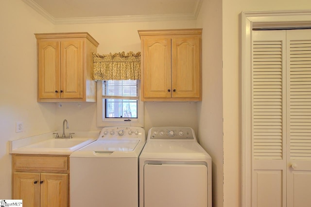 206 Chelsea Ln, Greer, SC 29650 - laundry area with cabinet space, ornamental molding, a sink, and independent washer and dryer