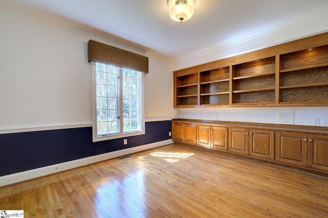 206 Chelsea Ln, Greer, SC 29650 - unfurnished office with baseboards, visible vents, light wood-style floors, and ornamental molding