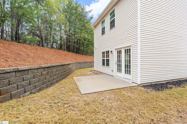 view of yard featuring fence and a patio area