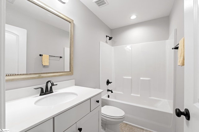 bathroom with bathing tub / shower combination, visible vents, toilet, and vanity