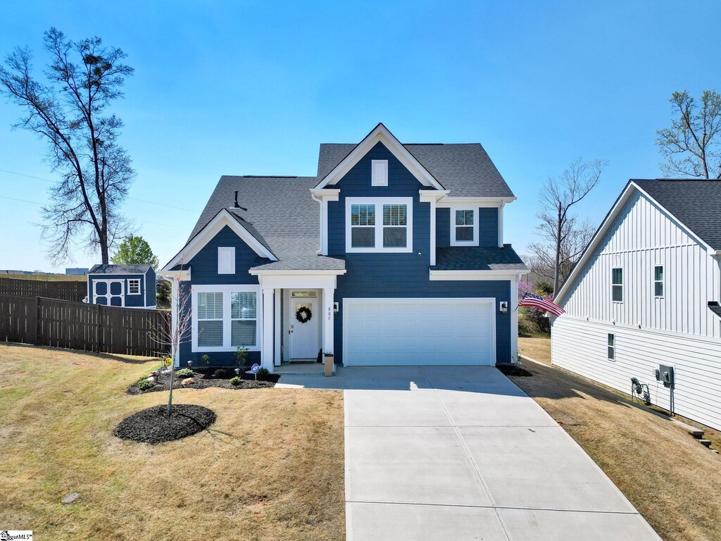 805 Pleasant Falls Dr, Moore, SC 29369 - view of front of home with driveway, a front yard, roof with shingles, fence, and an attached garage