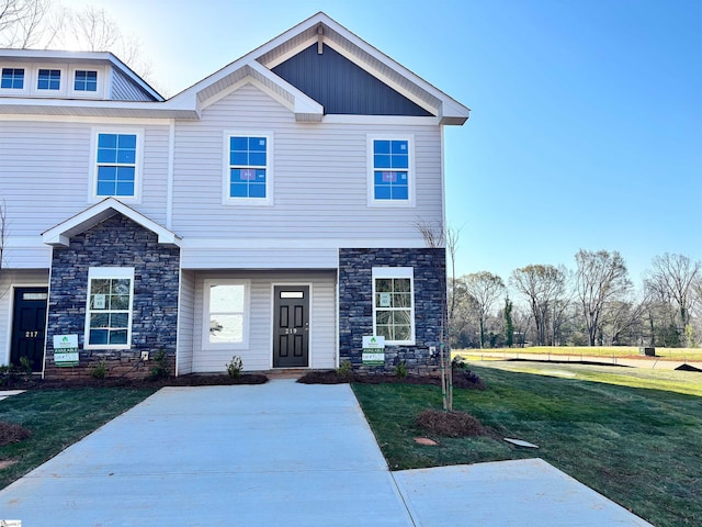 219 Islay Way, Anderson, SC 29621 - view of front of house with stone siding and a front lawn
