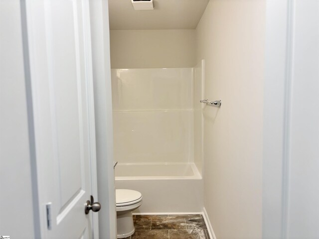 219 Islay Way, Anderson, SC 29621 - bathroom featuring toilet, baseboards, and washtub / shower combination
