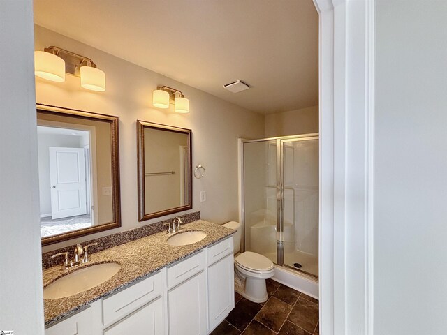 219 Islay Way, Anderson, SC 29621 - bathroom with a sink, toilet, and a shower stall