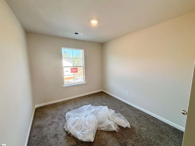 219 Islay Way, Anderson, SC 29621 - unfurnished room featuring baseboards, visible vents, and dark carpet