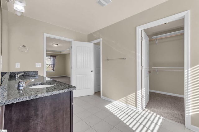 202 Redmont Ct, Simpsonville, SC 29680 - full bath with tile patterned flooring, baseboards, a sink, visible vents, and double vanity