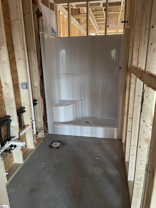 bathroom with concrete floors